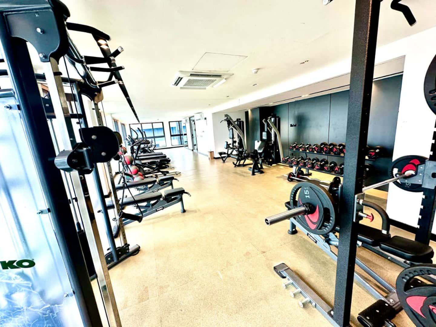 Residents gym with cardio machines and free weights